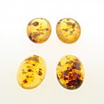 14x10mm. TORTOISE BROWN SPECKLE SHINY OVAL CABOCHONS - Lot of 48